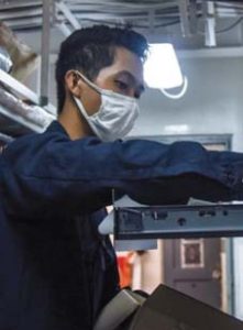 Seaman aboard warship